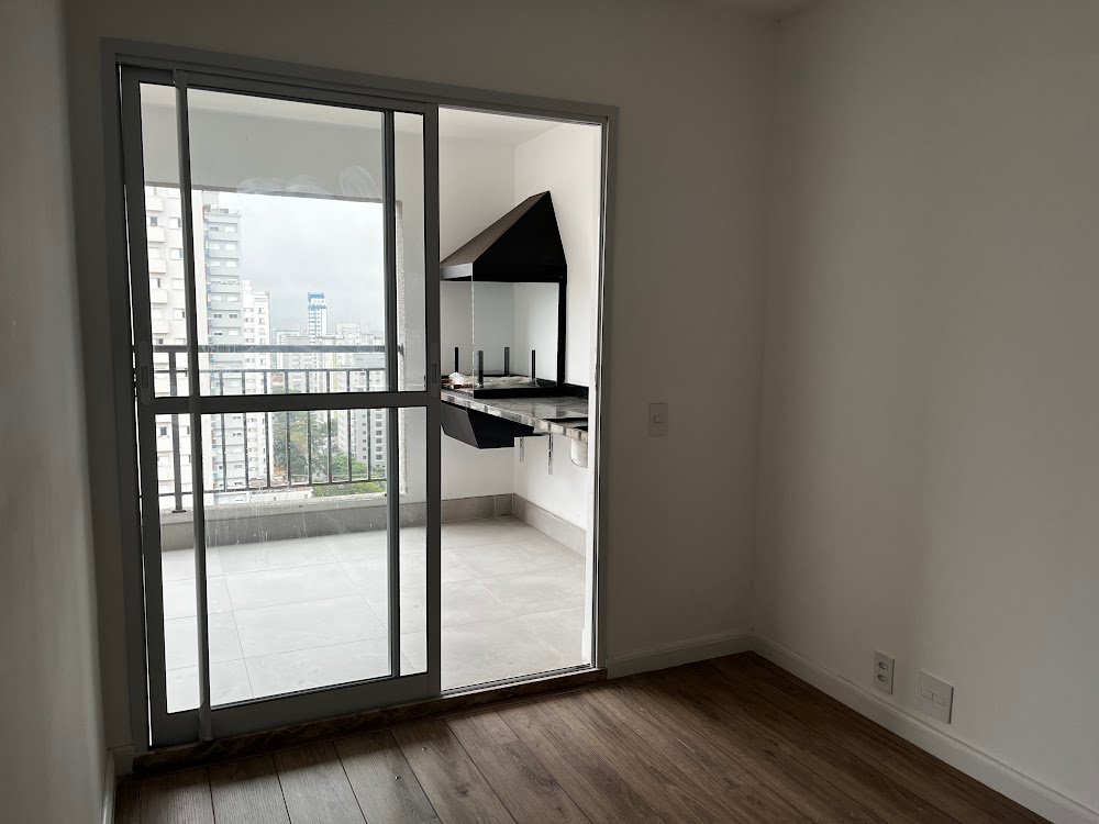 Terraço com churrasqueira do apartamento de 69 m² à venda no Living Heredità Alto do Ipiranga